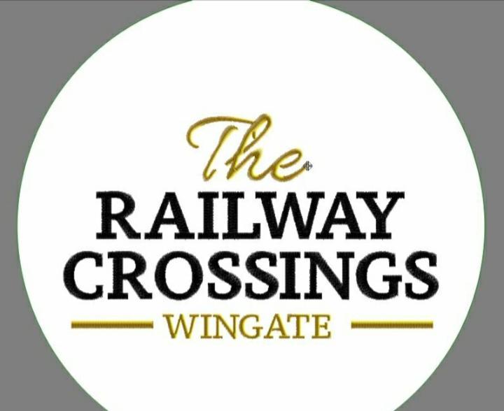 The Railway Crossings Hotel Wingate Exterior photo